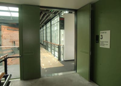 Federal Center South-Seattle, WA. Factory Painted Doors, matching inserts in exit devices